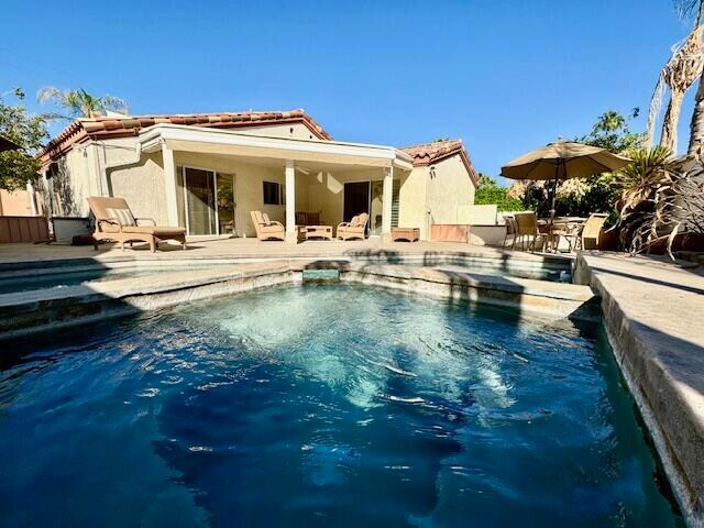 view of pool with a patio