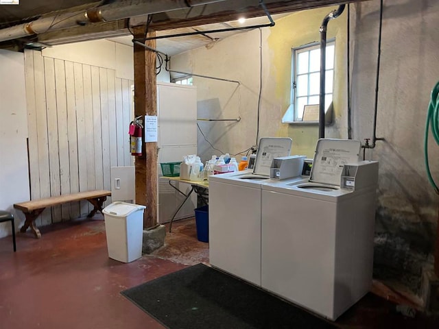 laundry room featuring washing machine and dryer