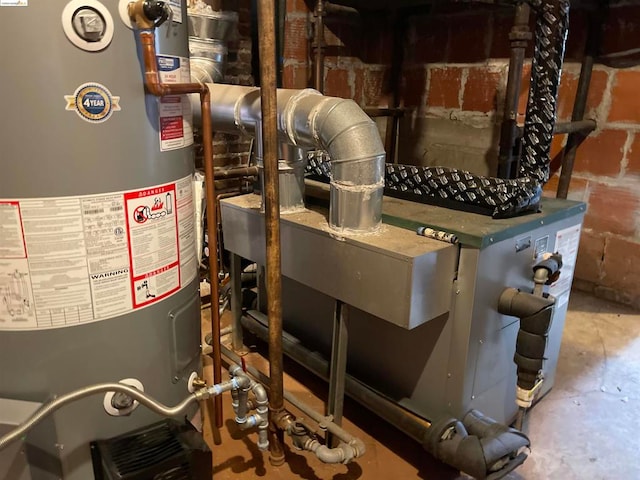 utility room with water heater