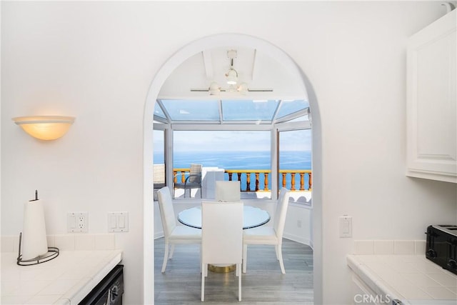 42 Camino De Flores Unit 60, Avalon, CA 90704 - dining area with wood finished floors and a healthy amount of sunlight