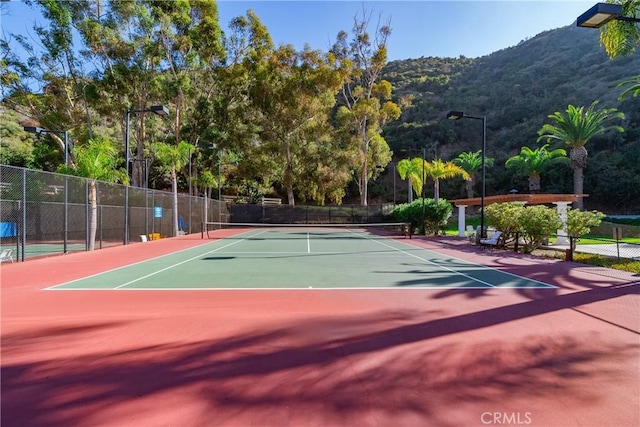 42 Camino De Flores Unit 60, Avalon, CA 90704 - view of sport court with fence, a mountain view, and community basketball court