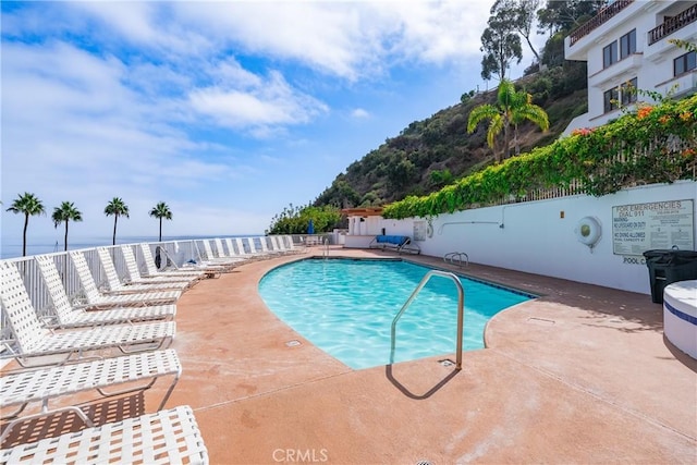 42 Camino De Flores Unit 60, Avalon, CA 90704 - community pool with fence and a patio area