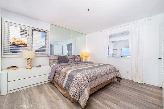 42 Camino De Flores Unit 60, Avalon, CA 90704 - bedroom with wood finished floors and baseboards