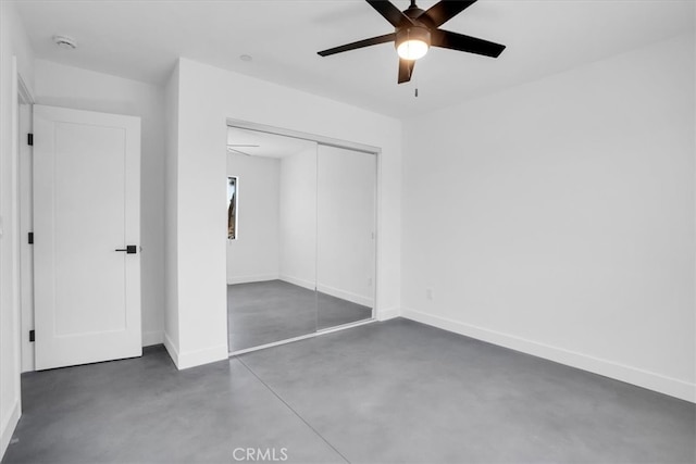 unfurnished bedroom with a closet and ceiling fan