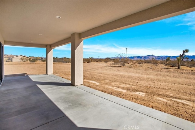 view of patio featuring a mountain view