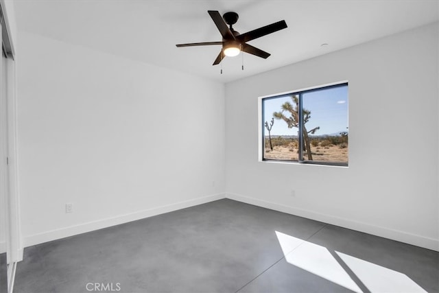 unfurnished room with ceiling fan