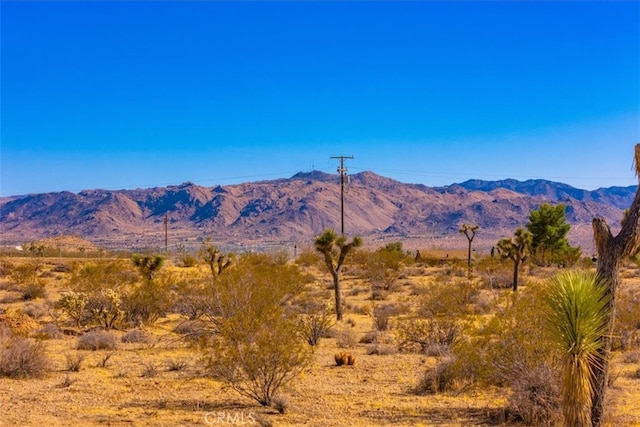 view of mountain feature featuring a rural view