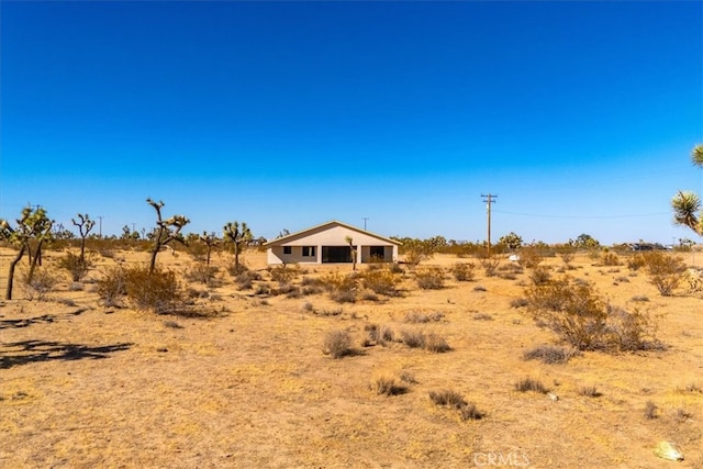 exterior space with a rural view