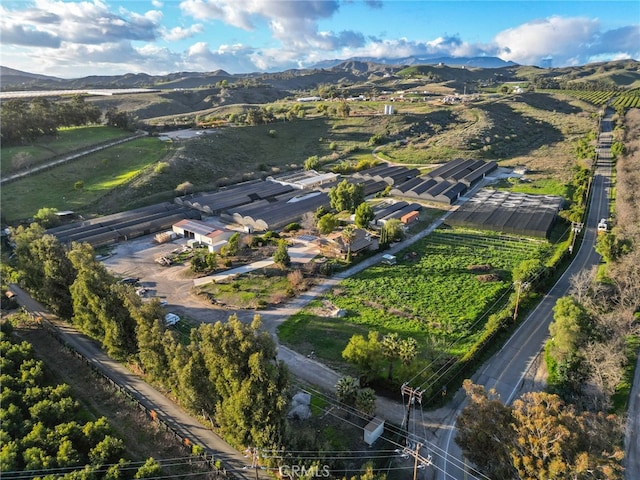 bird's eye view with a mountain view and a rural view
