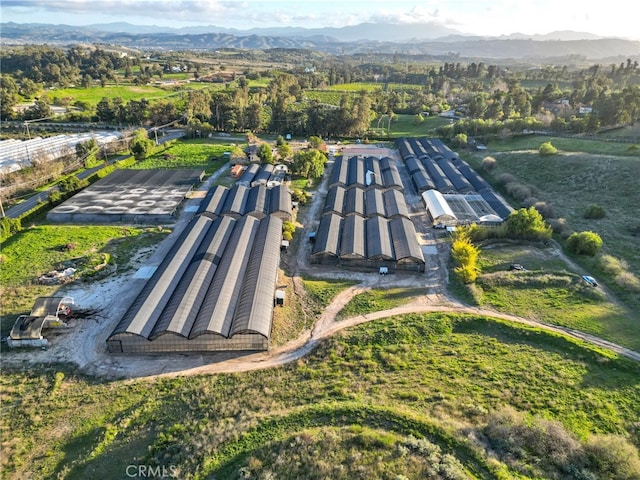 drone / aerial view featuring a mountain view