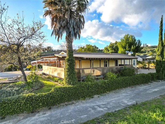 exterior space with a carport