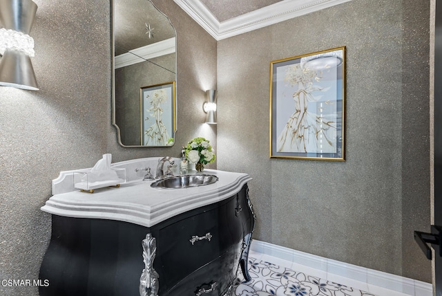 bathroom with vanity, crown molding, and tile patterned flooring