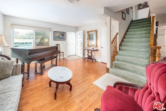 sitting room featuring wood-type flooring