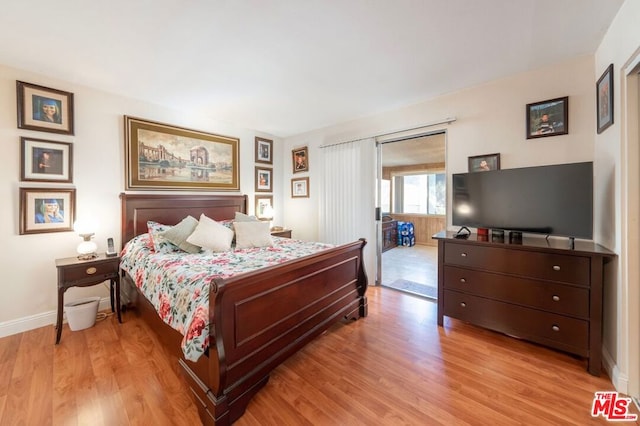 bedroom with light wood-type flooring