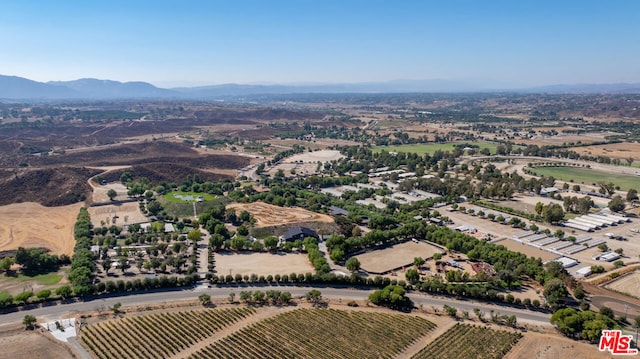 drone / aerial view featuring a mountain view