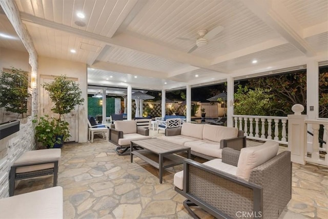 view of patio / terrace with an outdoor living space and ceiling fan