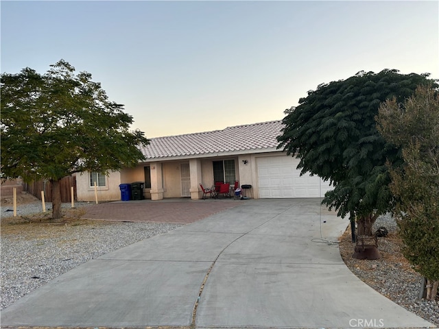 view of front of property featuring a garage