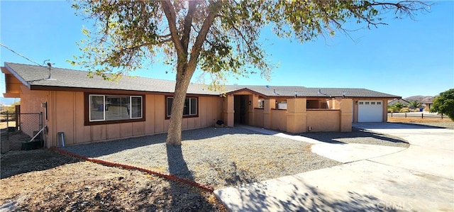 ranch-style house with a garage