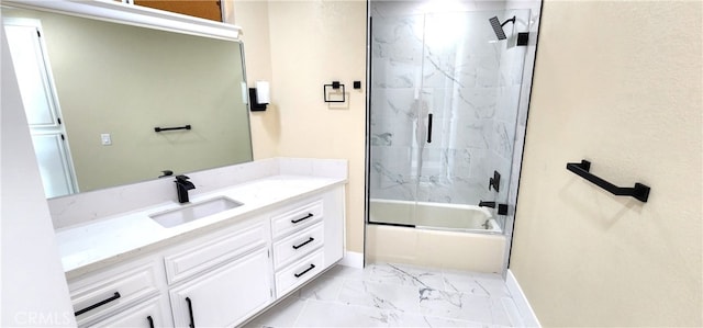 bathroom with shower / bath combination with glass door and vanity