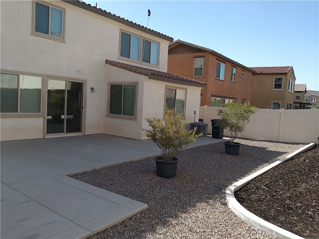 back of property featuring a patio area