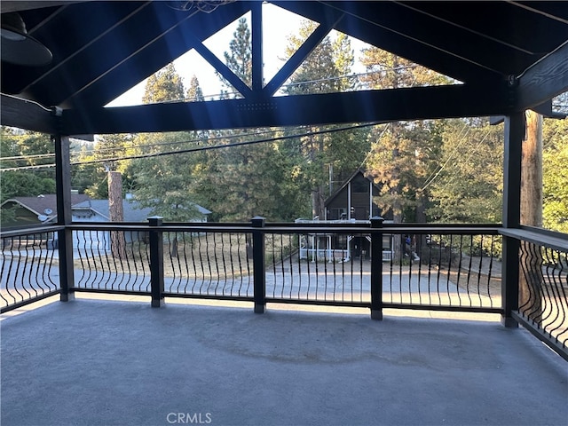 view of patio featuring a balcony