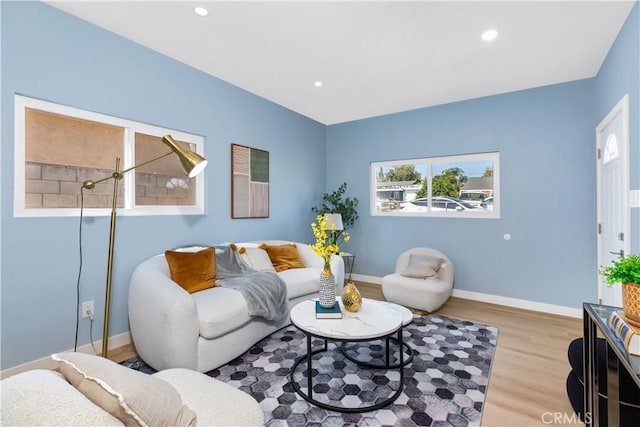 living room with light hardwood / wood-style floors