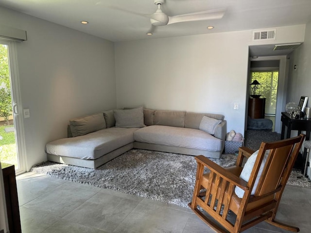 living room with ceiling fan