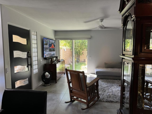 interior space featuring ceiling fan