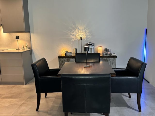 dining room with light tile patterned floors