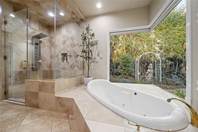 bathroom with shower with separate bathtub and sink