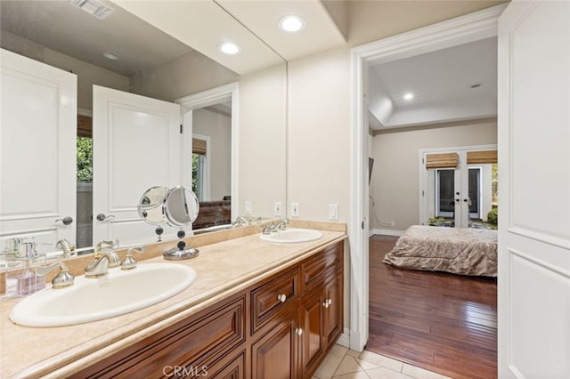 bathroom with wood-type flooring and vanity