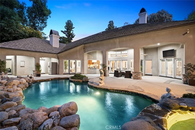 view of pool with a patio area