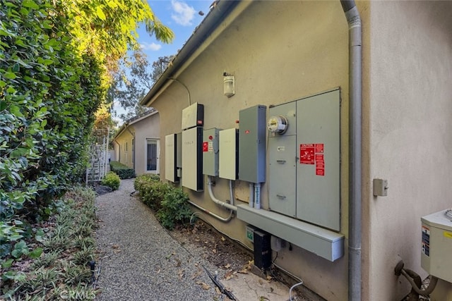 view of side of home featuring a mail area