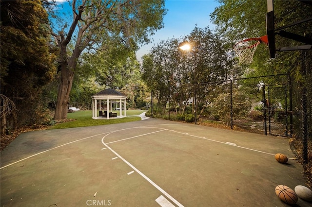 view of sport court featuring a gazebo