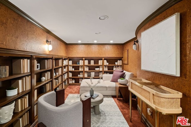 sitting room featuring ornamental molding