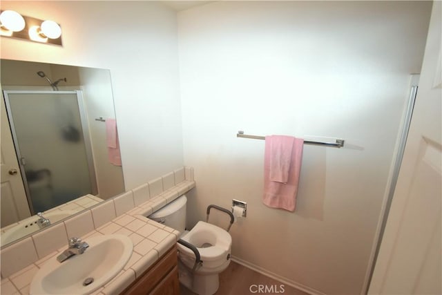 bathroom featuring toilet, vanity, wood-type flooring, and walk in shower