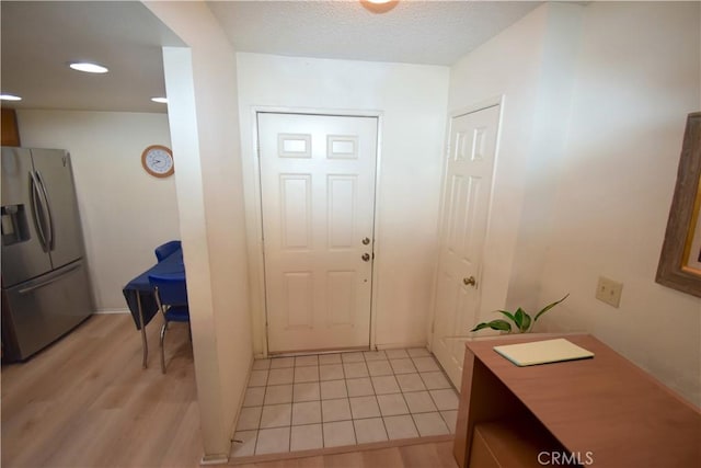 entryway with light wood-type flooring