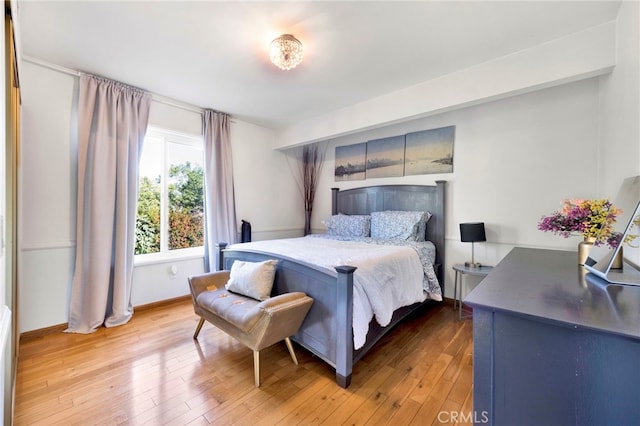 bedroom featuring hardwood / wood-style flooring