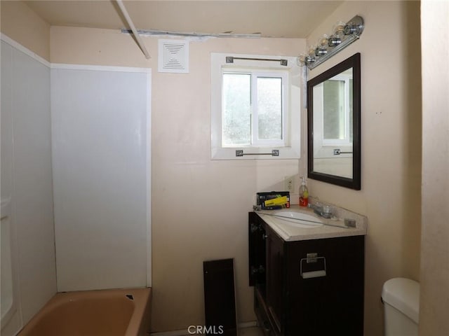 bathroom with vanity and toilet