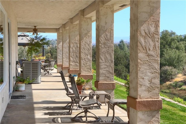 view of patio / terrace with outdoor dining area and central AC