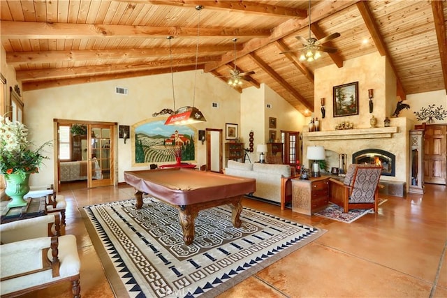 rec room with a warm lit fireplace, high vaulted ceiling, visible vents, a ceiling fan, and billiards