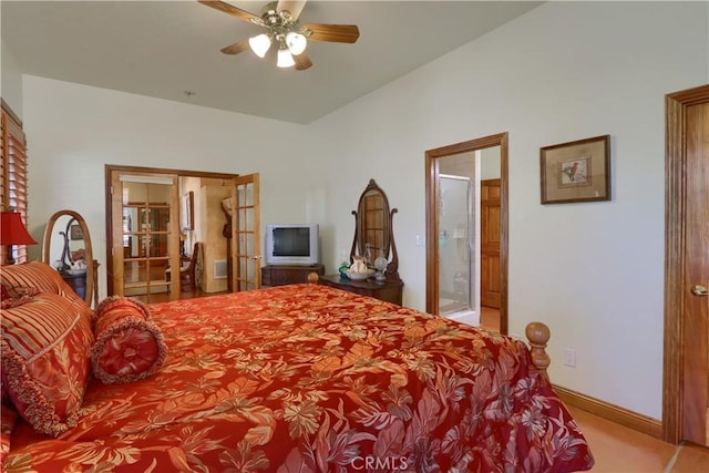 carpeted bedroom featuring french doors, baseboards, and lofted ceiling