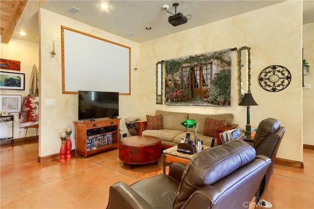 living room with baseboards and finished concrete floors
