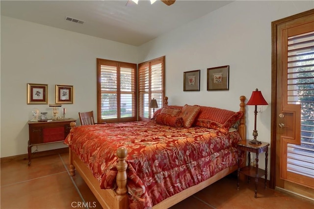bedroom with a ceiling fan, baseboards, and visible vents