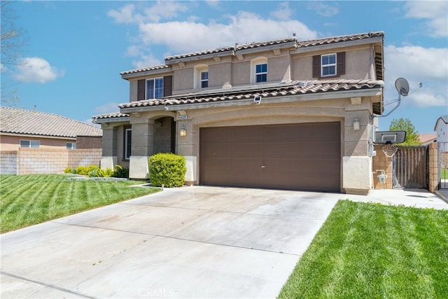 mediterranean / spanish home featuring a garage and a front lawn