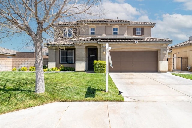 mediterranean / spanish-style house with a garage and a front lawn