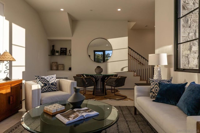 living room with lofted ceiling