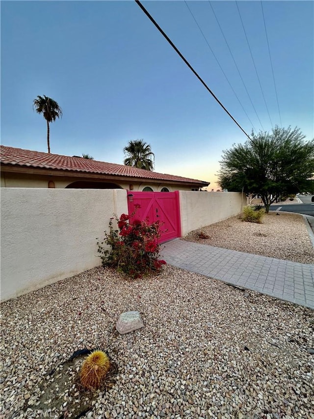 view of property exterior at dusk