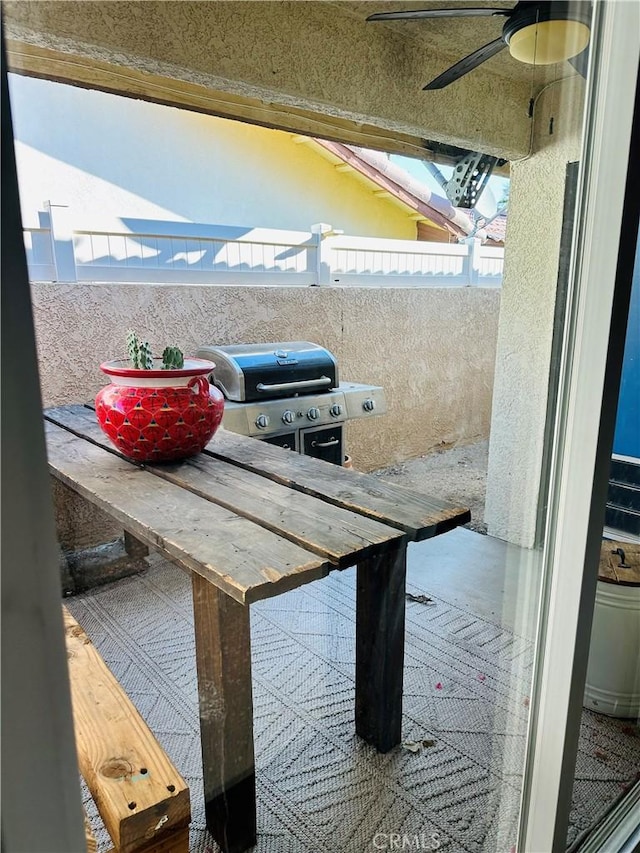 balcony with an outdoor bar and area for grilling