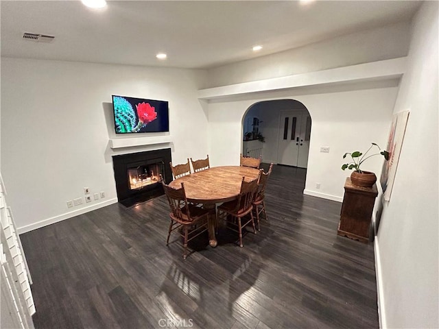 dining room featuring dark hardwood / wood-style floors